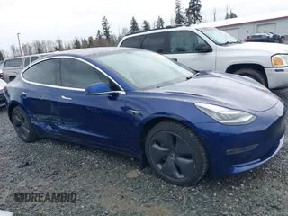 2019 Tesla Model 3 Long Range with VIN 5YJ3E1EB8KF512950, listed as a IAAI auction lot 41836349 with 55,607 mi miles and . Bid and sale history available at DreamBid. Image 6.