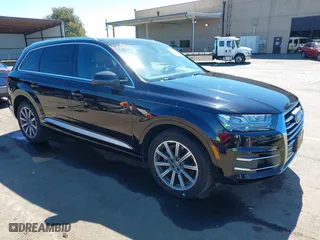 2018 Audi Q7 Premium Plus with VIN WA1LAAF71JD047403, listed as a IAAI auction lot 41871570 with 103,671 mi miles. Bid and sale history available at carsss.com. Image 1.
