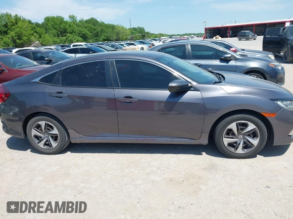 2019 Honda Civic Sedan LX with VIN 19XFC2F63KE025722, listed as a IAAI auction lot 42045594 with 57,290 mi miles. Bid and sale history available at carsss.com. Image 13.