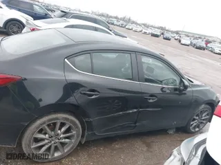 2018 Mazda Mazda3 4-Door Touring with VIN 3MZBN1V35JM243351, listed as a IAAI auction lot 41459525 with 55,765 mi miles. Bid and sale history available at carsss.com. Image 12.