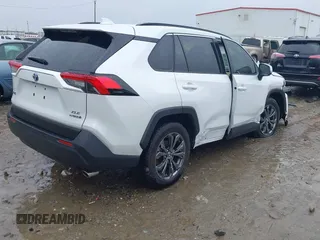 2023 Toyota RAV4 Hybrid XLE Premium with VIN JTMB6RFV4PD114763, listed as a IAAI auction lot 41766812 with 6,768 mi miles. Bid and sale history available at carsss.com. Image 4.