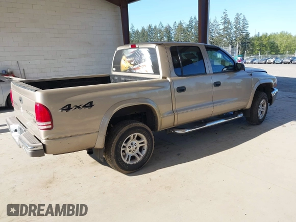 2003 Dodge Dakota SLT with VIN 1D7HG48N03S344321, listed as a IAAI auction lot 42074421 with 96,489 mi miles and . Bid and sale history available at DreamBid. Image 4.