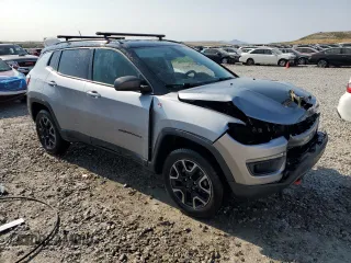 2019 Jeep Compass Trailhawk with VIN 3C4NJDDB9KT668858, listed as a Copart auction lot 58603645 with 74,226 mi miles and Salvage title. Bid and sale history available at DreamBid. Image 4.