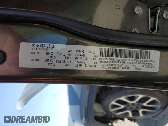 2018 Jeep Compass Limited with VIN 3C4NJDCB9JT261879, listed as a Copart auction lot 56523365 with 172,382 mi miles and Salvage title. Bid and sale history available at DreamBid. Image 13.