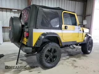 2002 Jeep Wrangler Sport z VIN 1J4FA49S02P730417, wystawiony jako Copart lot #59620865 z przebiegiem Nie podano mil oraz Szkoda całkowita • Salvage title. Historia ofert i sprzedaży dostępna na DreamBid. Obrazek 3.