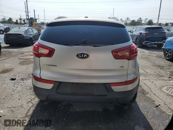 2012 Kia Sportage EX with VIN KNDPC3A21C7185453, listed as a Copart auction lot 56322245 with 142,410 mi miles and Salvage title. Bid and sale history available at DreamBid. Image 6.