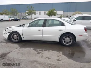 2001 Oldsmobile Aurora with VIN 1G3GS64C114109142, listed as a IAAI auction lot 41974652 with 81,395 mi miles. Bid and sale history available at carsss.com. Image 14.