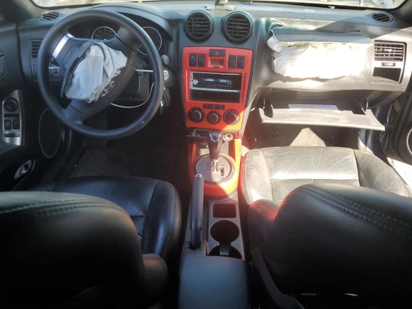2004 Hyundai Tiburon GT with VIN KMHHN65FX4U108253, listed as a Copart auction lot 77635034 with 34,170 mi miles and Salvage Title. Bid and sale history available at carsss.com. Image 8.