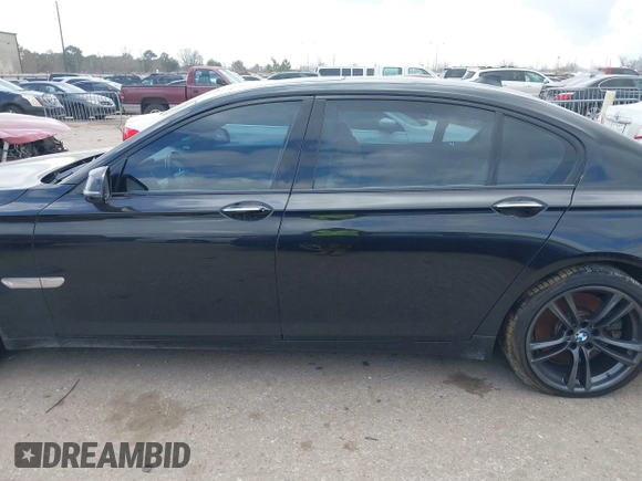2013 BMW 7 Series 750Li with VIN WBAYE8C55DD133178, listed as a IAAI auction lot 41509860 with 90,841 mi miles and . Bid and sale history available at DreamBid. Image 14.