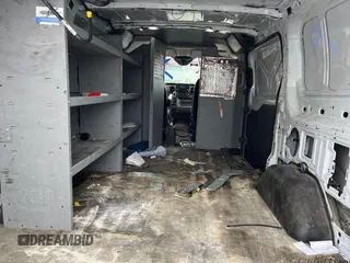 2020 Ford Transit Cargo with VIN 1FTYE1Y85LKB46360, listed as a IAAI auction lot 42599789 with 103,109 mi miles and . Bid and sale history available at DreamBid. Image 2.