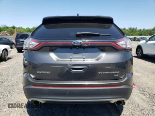 2015 Ford Edge Titanium z VIN 2FMPK4K8XFBB98334, wystawiony jako Copart lot #56953495 z przebiegiem 110 129 mil mil oraz Szkody całkowita. Historia ofert i sprzedaży dostępna na DreamBid. Obrazek 6.