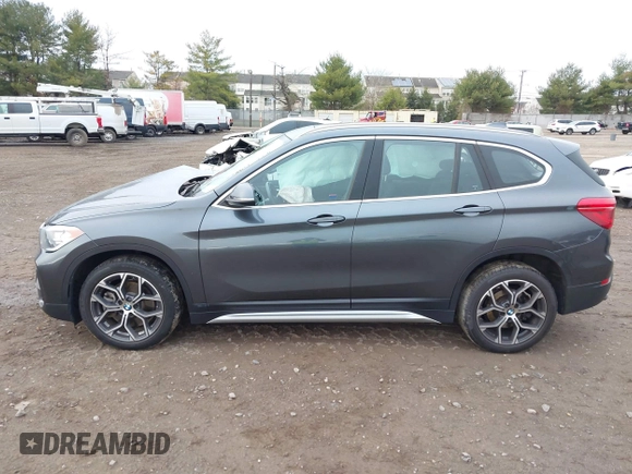 2021 BMW X1 xDrive28i with VIN WBXJG9C06M5S05303, listed as a IAAI auction lot 41060130 with 29,644 mi miles. Bid and sale history available at carsss.com. Image 15.