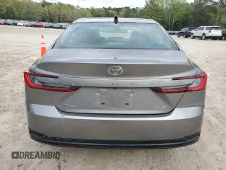 2025 Toyota Camry LE with VIN 4T1DAACKXSU556874, listed as a Copart auction lot 52694525 with 7,076 mi miles and Salvage Title. Bid and sale history available at carsss.com. Image 6.