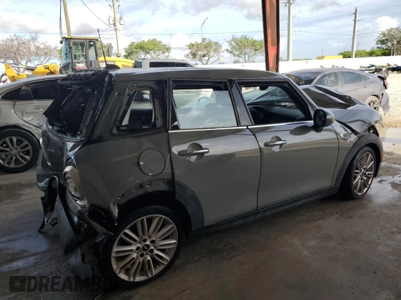 2018 MINI Hardtop 4 Door Cooper with VIN WMWXU1C55J2F79623, listed as a Copart auction lot 60515015 with Not provided miles and Salvage title. Bid and sale history available at DreamBid. Image 3.