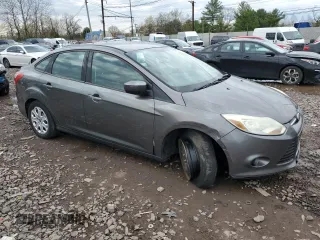 2012 Ford Focus SE with VIN 1FAHP3F25CL168038, listed as a Copart auction lot 51965405 with 80,843 mi miles and Salvage Title. Bid and sale history available at DreamBid. Image 4.