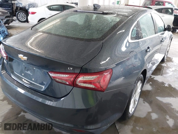 2020 Chevrolet Malibu LT with VIN 1G1ZD5STXLF052438, listed as a IAAI auction lot 42006000 with 140,513 mi miles and . Bid and sale history available at DreamBid. Image 4.