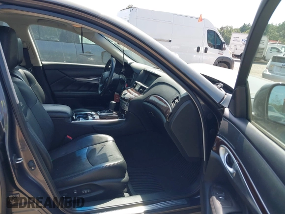 2012 Infiniti M with VIN JN1BY1AR3CM390550, listed as a IAAI auction lot 42797466 with 177,338 mi miles and . Bid and sale history available at DreamBid. Image 5.