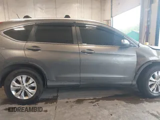 2012 Honda CR-V EX-L z VIN JHLRM4H78CC017235, wystawiony jako IAAI lot #42318504 z przebiegiem 161 069 mil mil oraz . Historia ofert i sprzedaży dostępna na DreamBid. Obrazek 13.