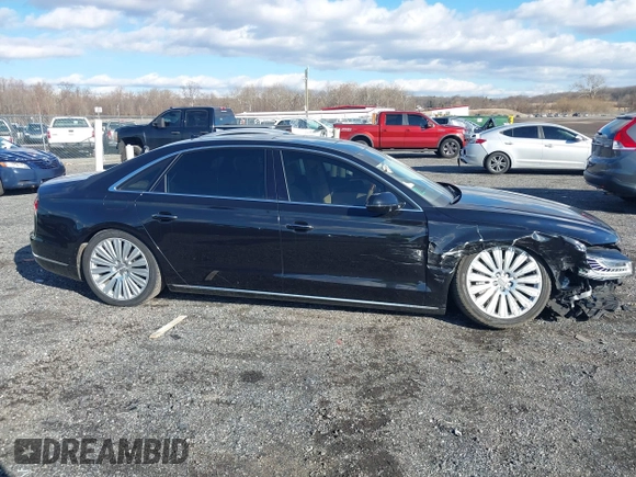 2015 Audi A8 L 4.0T with VIN WAU32AFD4FN014063, listed as a IAAI auction lot 41501970 with 158,570 mi miles. Bid and sale history available at carsss.com. Image 14.
