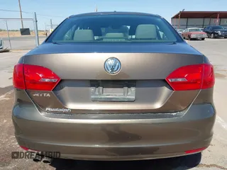 2014 Volkswagen Jetta S with VIN 3VW2K7AJ8EM319182, listed as a IAAI auction lot 42180101 with 133,495 mi miles and . Bid and sale history available at DreamBid. Image 16.