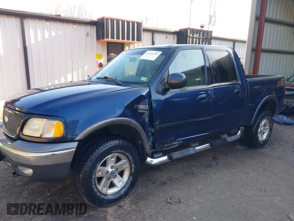 2002 Ford F-150 XLT with VIN 1FTRW086X2KE17566, listed as a IAAI auction lot 41721236 with 98,524 mi miles. Bid and sale history available at carsss.com. Image 6.