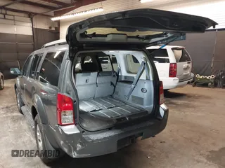 2005 Nissan Pathfinder SE with VIN 5N1AR18U95C730255, listed as a IAAI auction lot 41610769 with 154,252 mi miles. Bid and sale history available at carsss.com. Image 3.