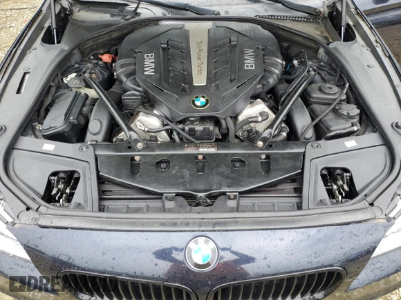 2012 BMW 5 Series 550i xDrive z VIN WBAFU9C54CC787576, wystawiony jako Copart lot #55934525 z przebiegiem 157 140 mil mil oraz Szkoda całkowita • Salvage title. Historia ofert i sprzedaży dostępna na DreamBid. Obrazek 11.