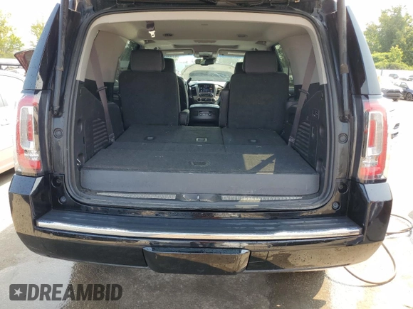 2015 GMC Yukon Denali with VIN 1GKS2CKJXFR547358, listed as a Copart auction lot 63906734 with 163,980 mi miles and Salvage Title. Bid and sale history available at carsss.com. Image 6.