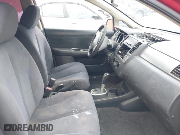 2009 Nissan Versa 1.8 S with VIN 3N1BC11E19L474039, listed as a IAAI auction lot 42045662 with 178,828 mi miles. Bid and sale history available at carsss.com. Image 5.