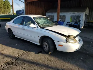 1999 Mercury Sable GS with VIN 1MEFM50S1XA659561, listed as a Copart auction lot 65649395 with 178,177 mi miles and Non repairable. Bid and sale history available at DreamBid. Image 4.