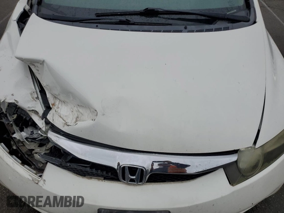 2009 Honda Civic LX z VIN 1HGFA16529L009019, wystawiony jako Copart lot #58039395 z przebiegiem 234 332 mil mil oraz Szkoda całkowita • Salvage title. Historia ofert i sprzedaży dostępna na DreamBid. Obrazek 11.