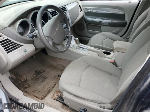 2007 Chrysler Sebring Touring z VIN 1C3LC56K57N527947, wystawiony jako Copart lot #52789485 z przebiegiem Nie podano mil oraz Szkody całkowita. Historia ofert i sprzedaży dostępna na DreamBid. Obrazek 7.