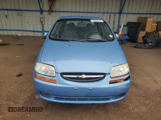 2005 Chevrolet Aveo LS z VIN KL1TD52655B300992, wystawiony jako Copart lot #55802575 z przebiegiem 63 781 mil mil oraz Szkody całkowita. Historia ofert i sprzedaży dostępna na DreamBid. Obrazek 5.