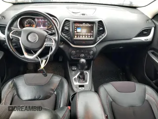 2014 Jeep Cherokee Trailhawk with VIN 1C4PJMBS1EW240177, listed as a Copart auction lot 43321715 with 212,339 mi miles and Salvage title. Bid and sale history available at DreamBid. Image 8.