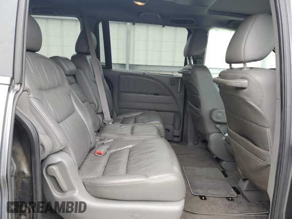 2010 Honda Odyssey EX-L z VIN 5FNRL3H71AB044612, wystawiony jako Copart lot #55473365 z przebiegiem 181 193 mil mil oraz Szkoda całkowita • Salvage title. Historia ofert i sprzedaży dostępna na DreamBid. Obrazek 11.