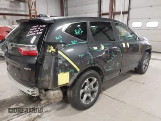 2017 Honda CR-V EX with VIN 5J6RW2H57HL059990, listed as a IAAI auction lot 41757025 with 136,533 mi miles. Bid and sale history available at carsss.com. Image 4.