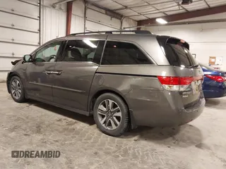 2016 Honda Odyssey Touring Elite with VIN 5FNRL5H92GB045824, listed as a IAAI auction lot 41872220 with 120,557 mi miles. Bid and sale history available at carsss.com. Image 3.