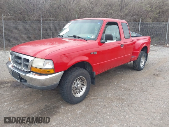 1999 Ford Ranger XL with VIN 1FTZR15V7XPC09843, listed as a IAAI auction lot 41897664 with 176,920 mi miles. Bid and sale history available at carsss.com. Image 2.