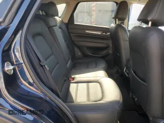 2021 Mazda CX-5 Grand Touring with VIN JM3KFADM7M0385788, listed as a Copart auction lot 88065255 with 27,787 mi miles and Salvage Title. Bid and sale history available at carsss.com. Image 11.