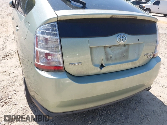 2007 Toyota Prius with VIN JTDKB20U977548064, listed as a IAAI auction lot 42040952 with 197,934 mi miles. Bid and sale history available at carsss.com. Image 6.