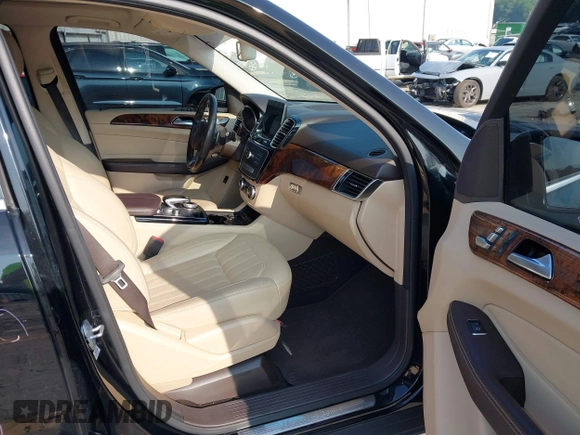 2016 Mercedes-Benz GLE 350 z VIN 4JGDA5JB5GA727131, wystawiony jako IAAI lot #42392219 z przebiegiem 106 531 mil mil oraz . Historia ofert i sprzedaży dostępna na DreamBid. Obrazek 5.