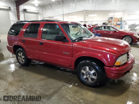 1999 Oldsmobile Bravada z VIN 1GHDT13W4X2705200, wystawiony jako Copart lot #43416245 z przebiegiem 173 522 mil mil oraz Szkoda całkowita • Salvage title. Historia ofert i sprzedaży dostępna na DreamBid. Obrazek 4.