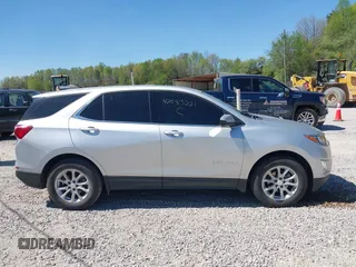 2020 Chevrolet Equinox LT z VIN 3GNAXKEV9LS687807, wystawiony jako IAAI lot #42083221 z przebiegiem Nie podano mil oraz . Historia ofert i sprzedaży dostępna na DreamBid. Obrazek 14.