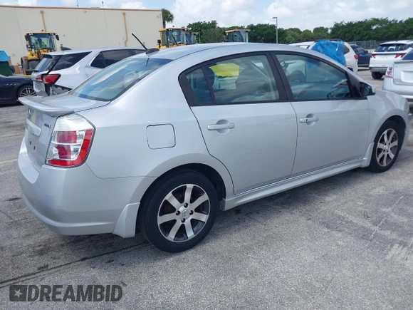 2012 Nissan Sentra S z VIN 3N1AB6AP7CL657434, wystawiony jako IAAI lot #42728376 z przebiegiem 150 930 mil mil oraz . Historia ofert i sprzedaży dostępna na DreamBid. Obrazek 4.