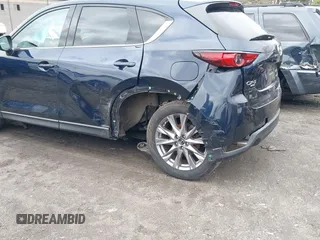2020 Mazda CX-5 Grand Touring with VIN JM3KFBDM7L1723852, listed as a IAAI auction lot 41848152 with 85,099 mi miles. Bid and sale history available at carsss.com. Image 6.