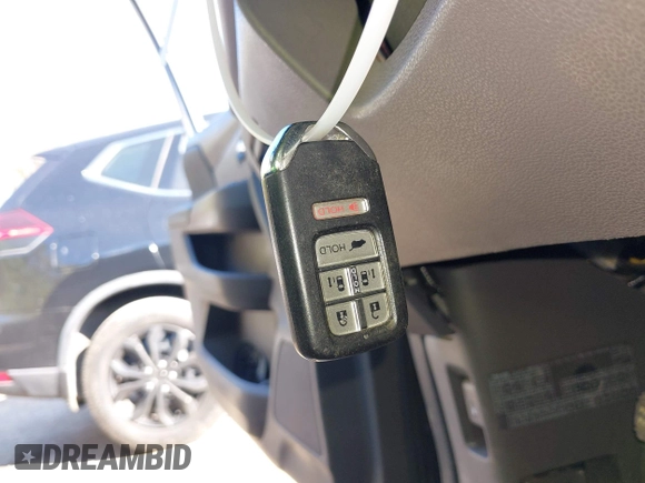 2015 Honda Odyssey Touring Elite with VIN 5FNRL5H99FB094727, listed as a IAAI auction lot 42001288 with 254,015 mi miles and . Bid and sale history available at DreamBid. Image 11.