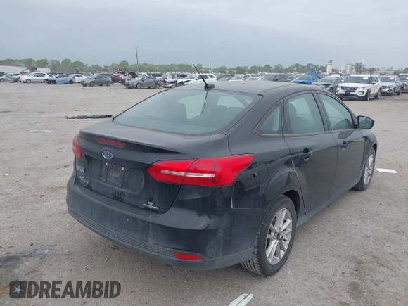 2016 Ford Focus SE with VIN 1FADP3F21GL305027, listed as a IAAI auction lot 41930646 with 106,127 mi miles and . Bid and sale history available at DreamBid. Image 4.
