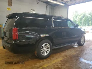 2015 Chevrolet Suburban LT z VIN 1GNSKJKC2FR744694, wystawiony jako Copart lot #56769735 z przebiegiem 125 944 mil mil oraz Szkoda całkowita • Salvage title. Historia ofert i sprzedaży dostępna na DreamBid. Obrazek 3.