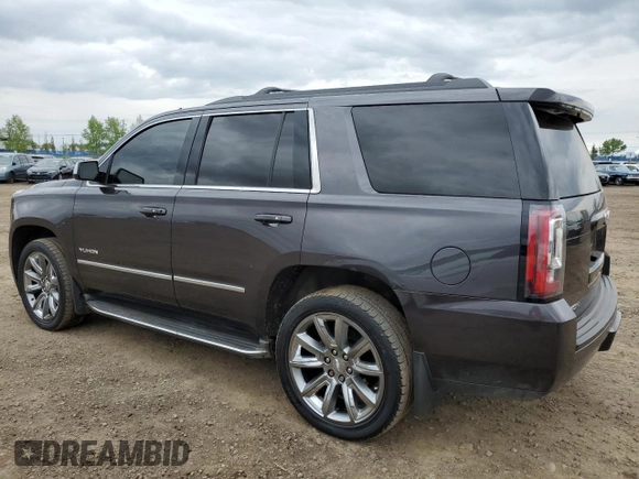 2015 GMC Yukon SLT z VIN 1GKS2BKCXFR269881, wystawiony jako Copart lot #57678175 z przebiegiem 256 703 mil mil oraz Czysty tytuł • Clean title. Historia ofert i sprzedaży dostępna na DreamBid. Obrazek 2.