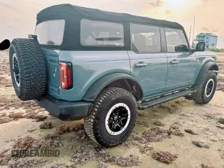 2022 Ford Bronco с VIN 1FMEE5DP3NLB62749, выставлен на аукционе Copart как лот 60267875 с пробегом 60 062 миль миль и Списание • Salvage title. История ставок и продаж доступна на DreamBid. Изображение 4.